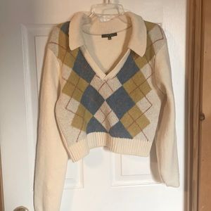 Crop top sweater with a collar from Tillys